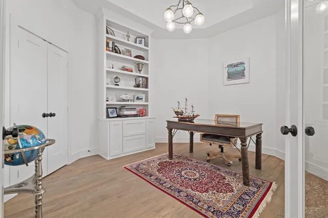 a view of a workspace with furniture