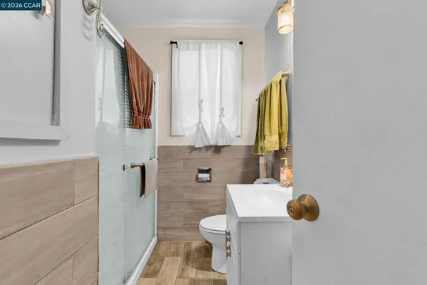 a bathroom with a toilet and a sink