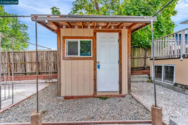 a backyard of a house with lots of green space