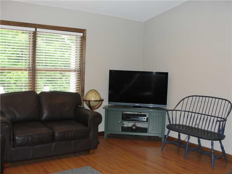 8 Hobbs Hill Road Harrison, ME 04040 - Photo 17 of 33 Living Room. Lots of windows make...