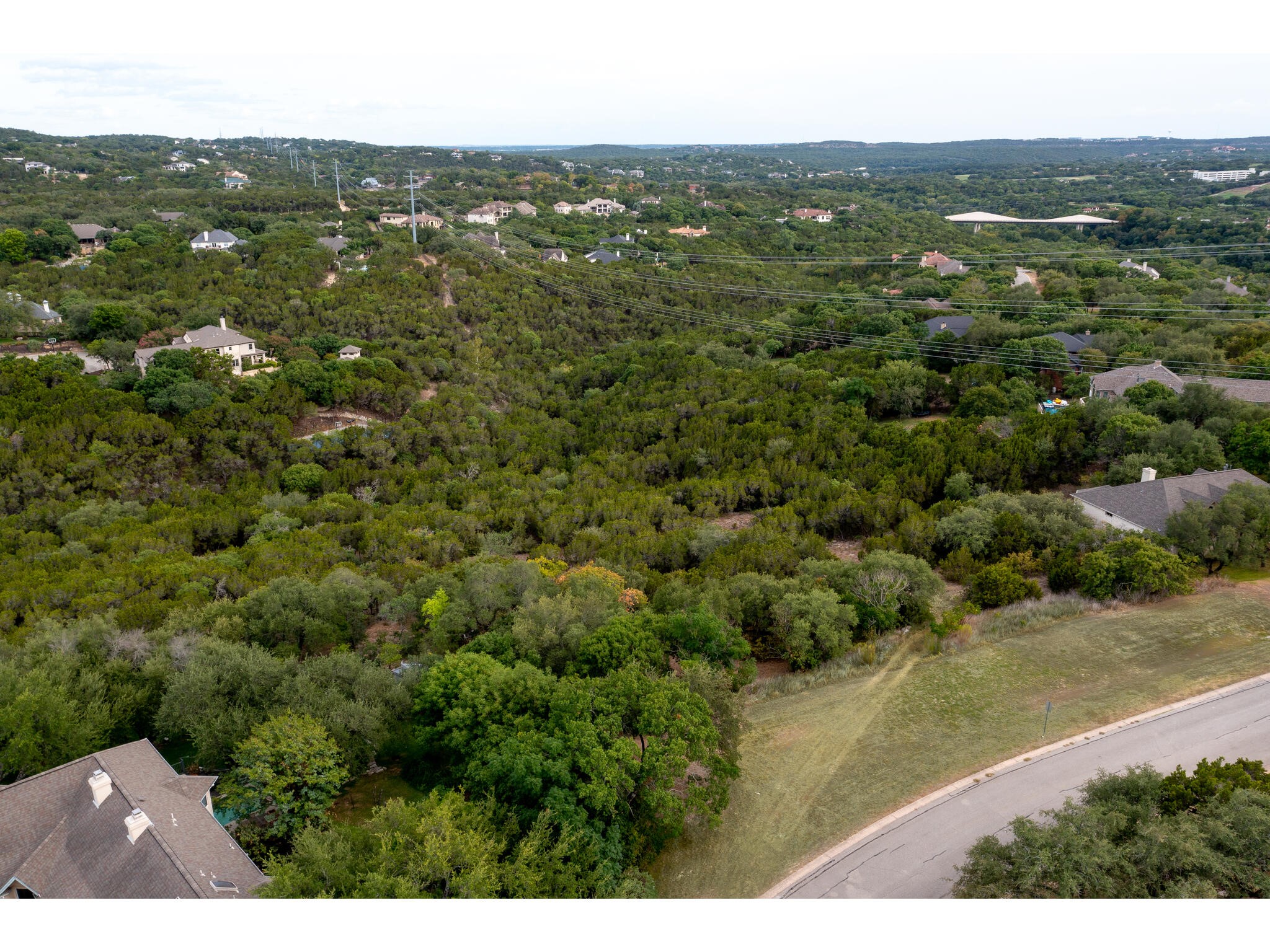539 Beardsley Lane Austin, TX 78746 - Photo 14 of 24 an aerial view of residential houses with outdoor space and trees