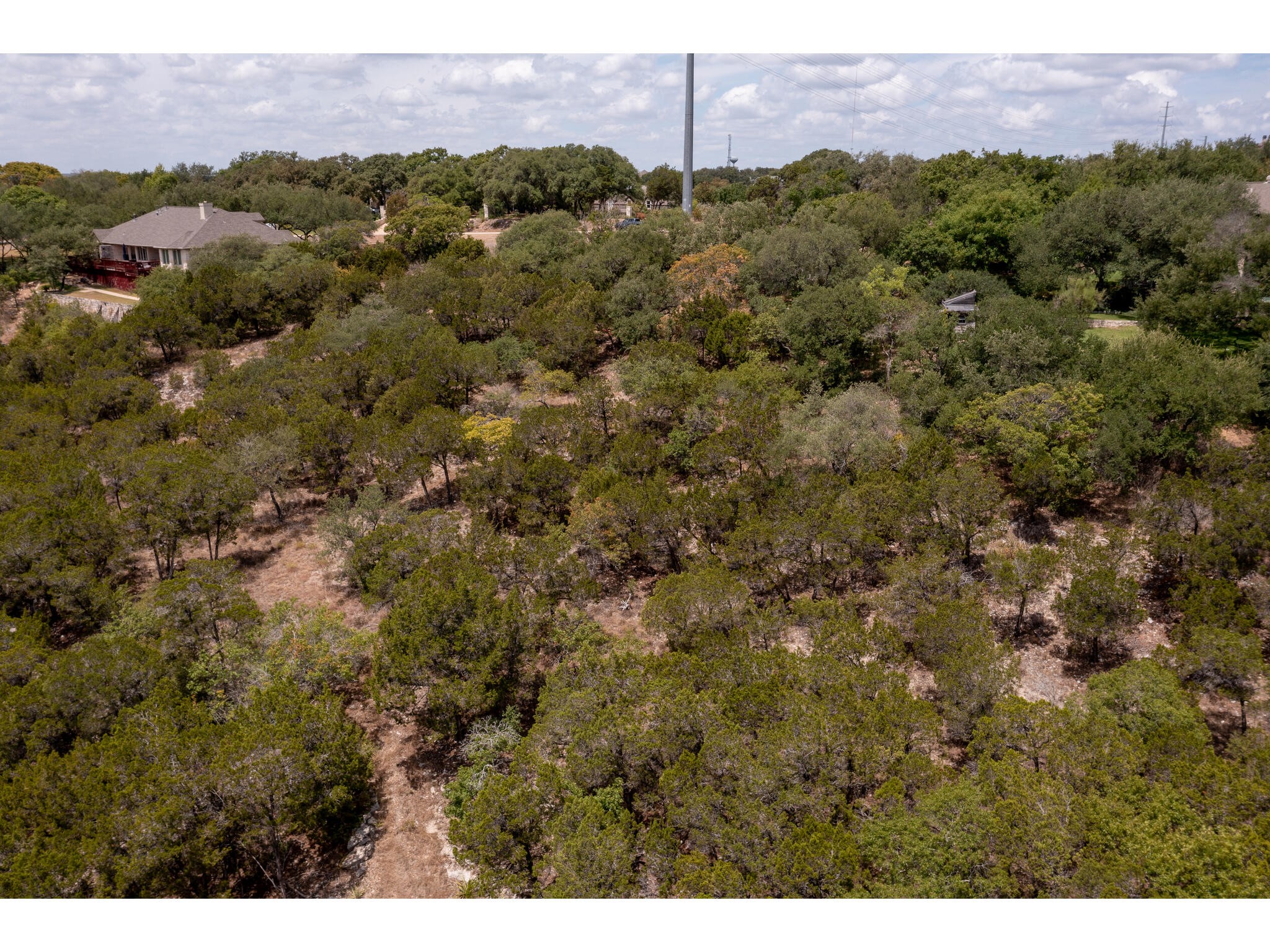 539 Beardsley Lane Austin, TX 78746 - Photo 22 of 24 a view of a city with a building