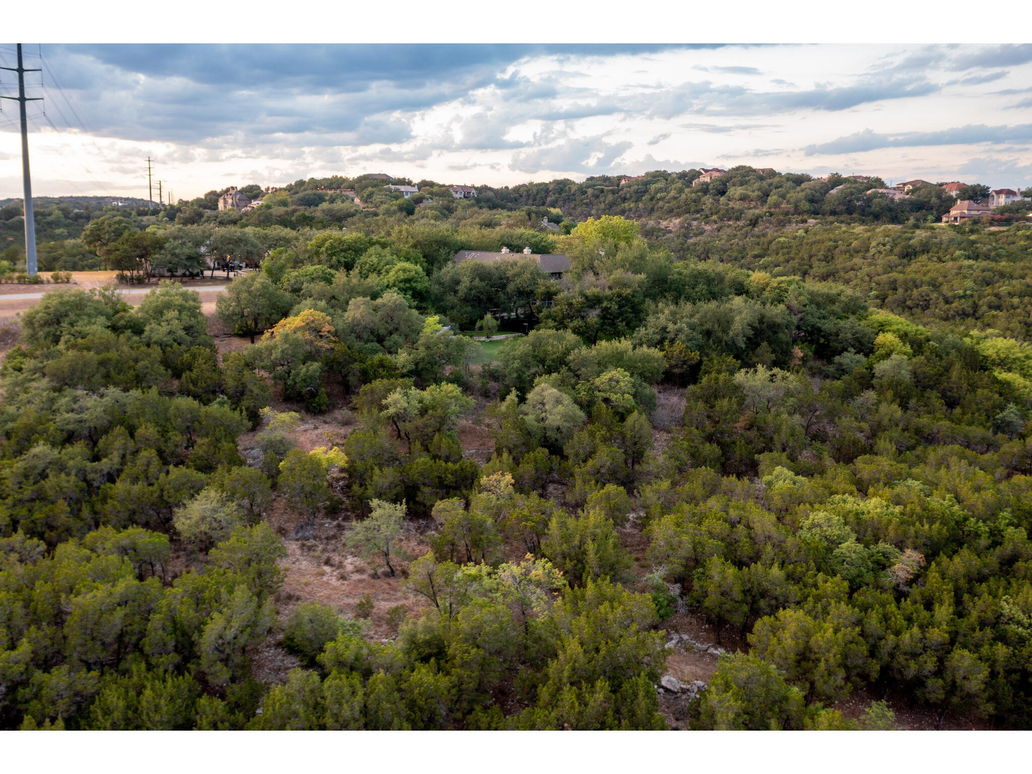 539 Beardsley Lane Austin, TX 78746 - Photo 4 of 24 a view of a city and mountains