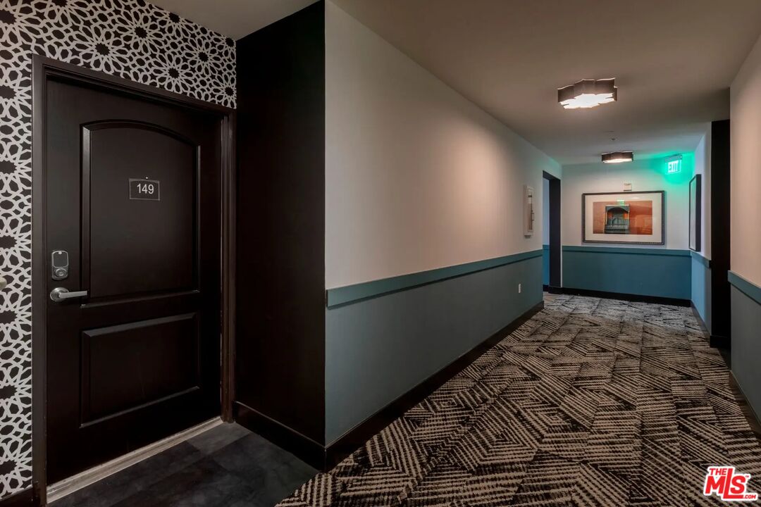 5710 Crescent Park East, Unit 324 Playa Vista, CA 90094 - Photo 16 of 29 a bedroom with a bed and a window