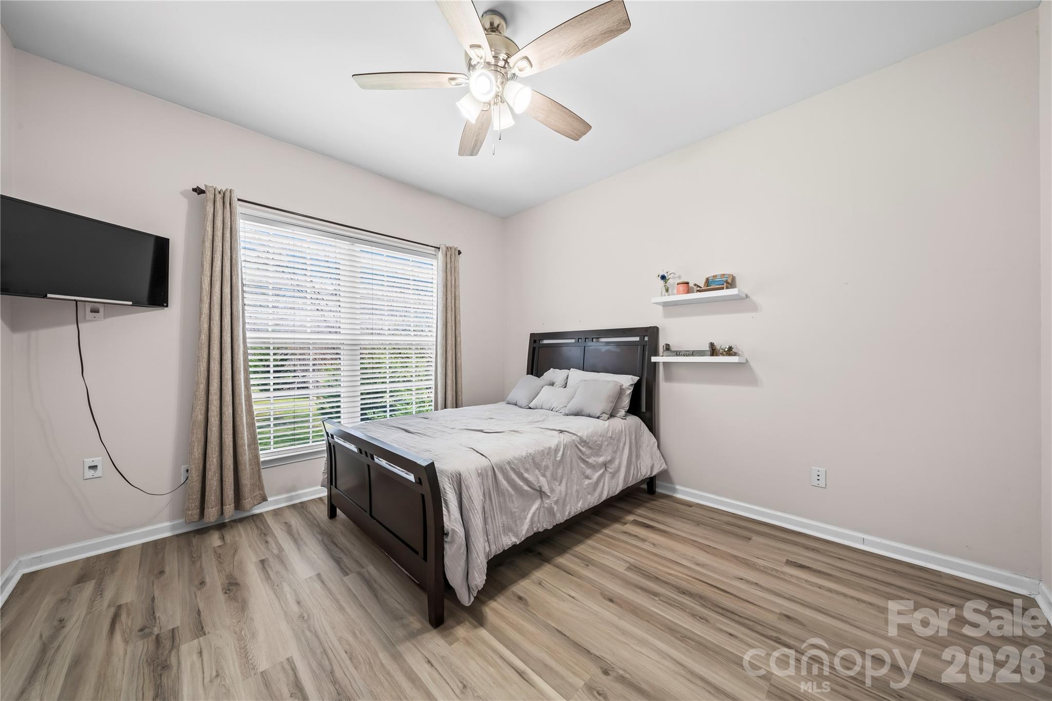 3715 Messina Road Clover, SC 29710 - Photo 16 of 33 a bedroom with a bed and a flat screen tv