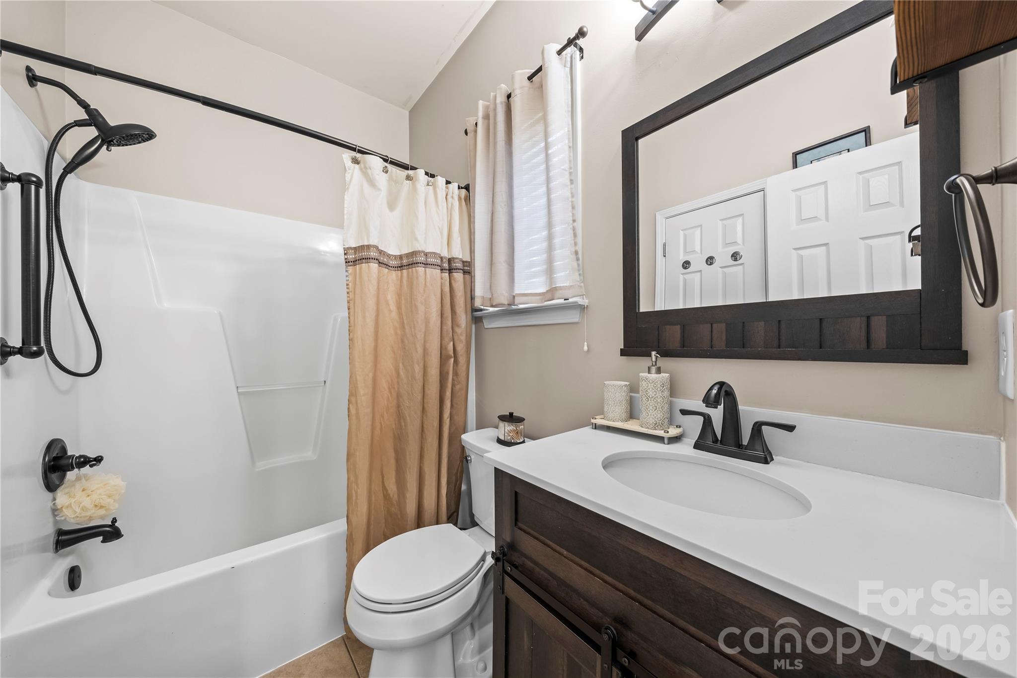 3715 Messina Road Clover, SC 29710 - Photo 17 of 33 a bathroom with a sink a toilet and shower