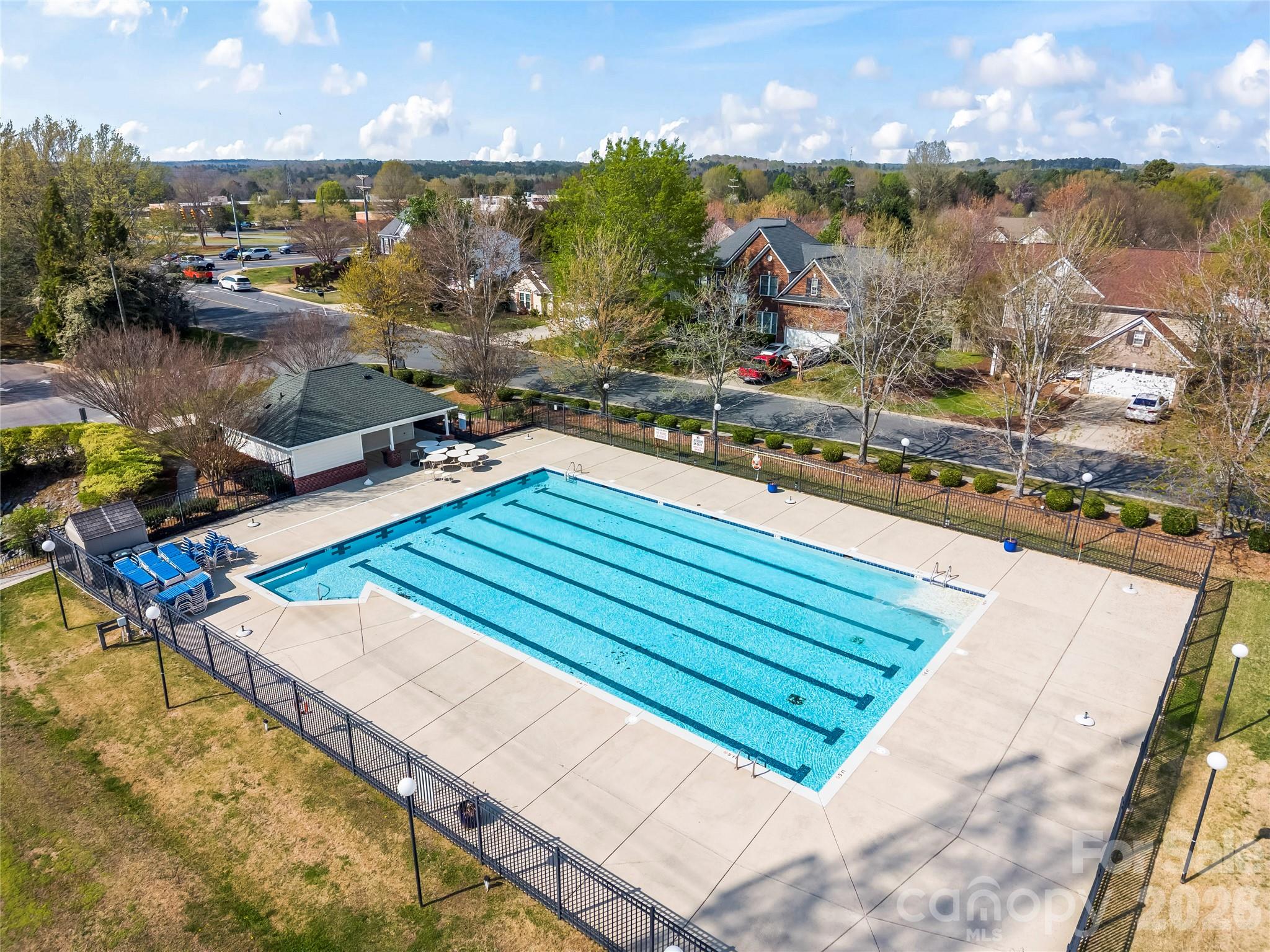 3715 Messina Road Clover, SC 29710 - Photo 33 of 33 a view of a swimming pool with outdoor seating and plants
