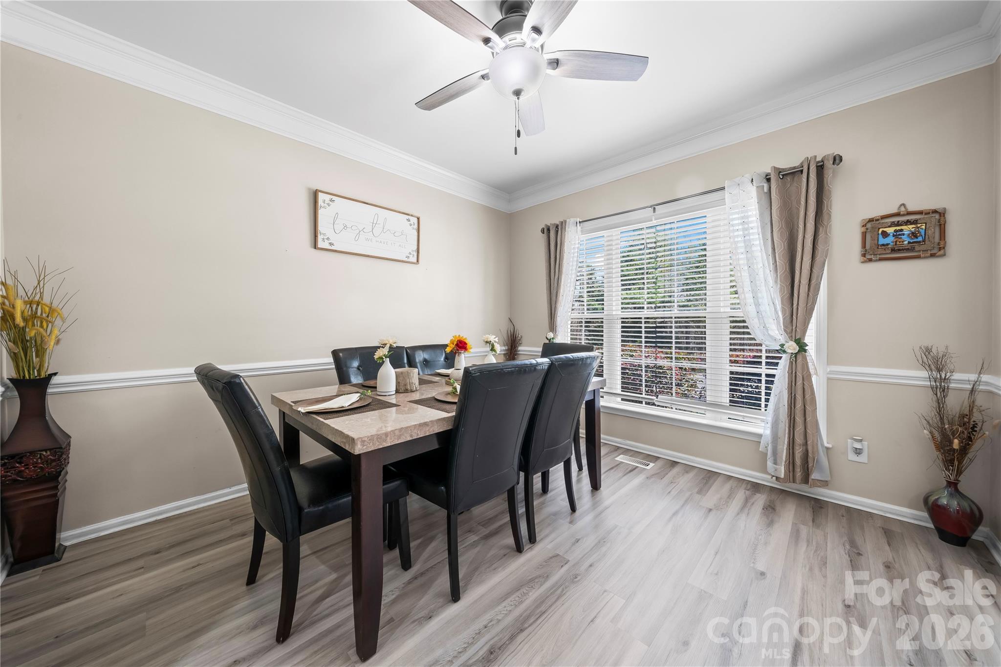 3715 Messina Road Clover, SC 29710 - Photo 6 of 33 a view of a dining room with furniture window and wooden floor