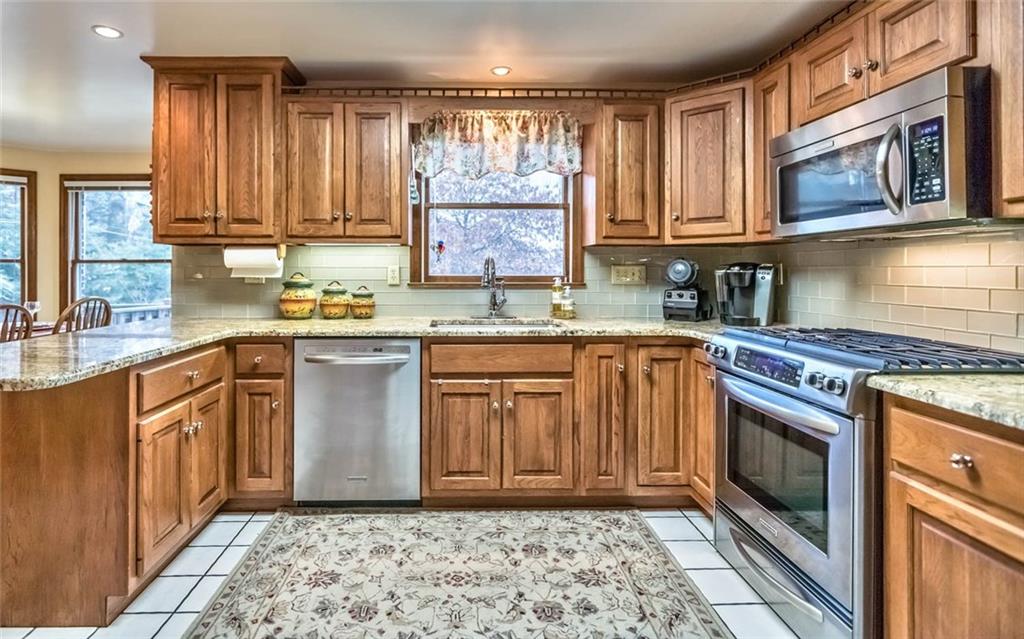 3125 East Hardies Road Gibsonia, PA 15044 - Photo 8 of 22 Kitchen has granite counters, plenty of work space and cabinets