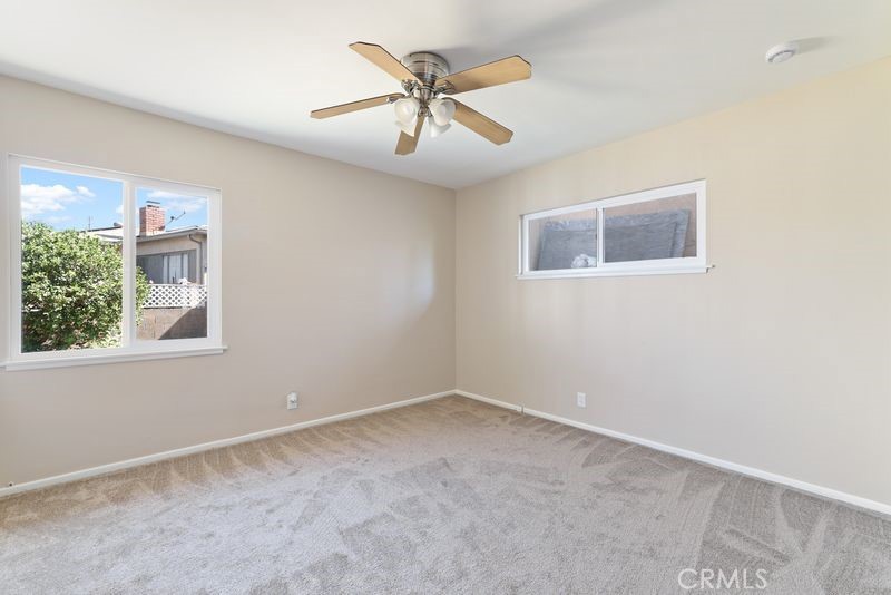 14802 Springford Drive La Mirada, CA 90638 - Photo 15 of 26 a view of an empty room with a window