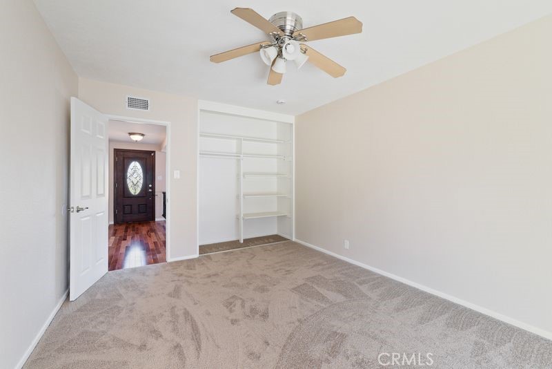 14802 Springford Drive La Mirada, CA 90638 - Photo 16 of 26 a view of a hallway with a bathroom