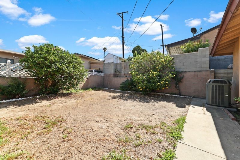 14802 Springford Drive La Mirada, CA 90638 - Photo 24 of 26 a night view of a backyard of the house
