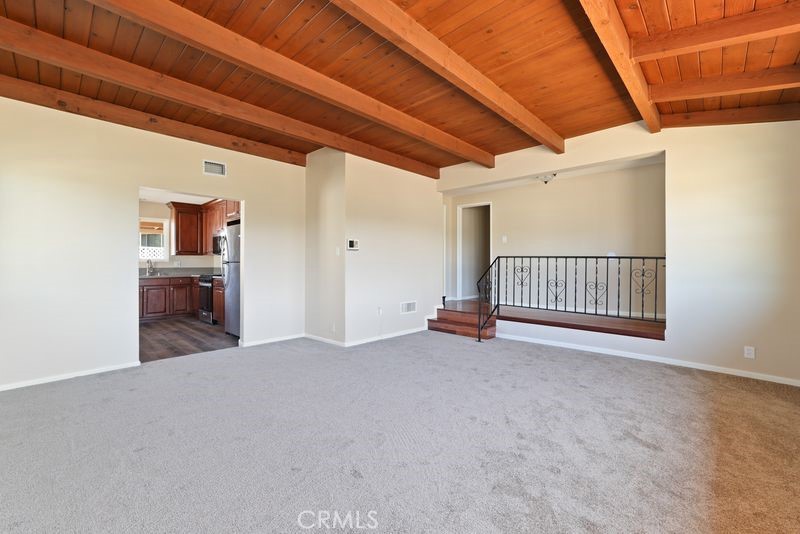 14802 Springford Drive La Mirada, CA 90638 - Photo 5 of 26 a view of an empty room with a fireplace