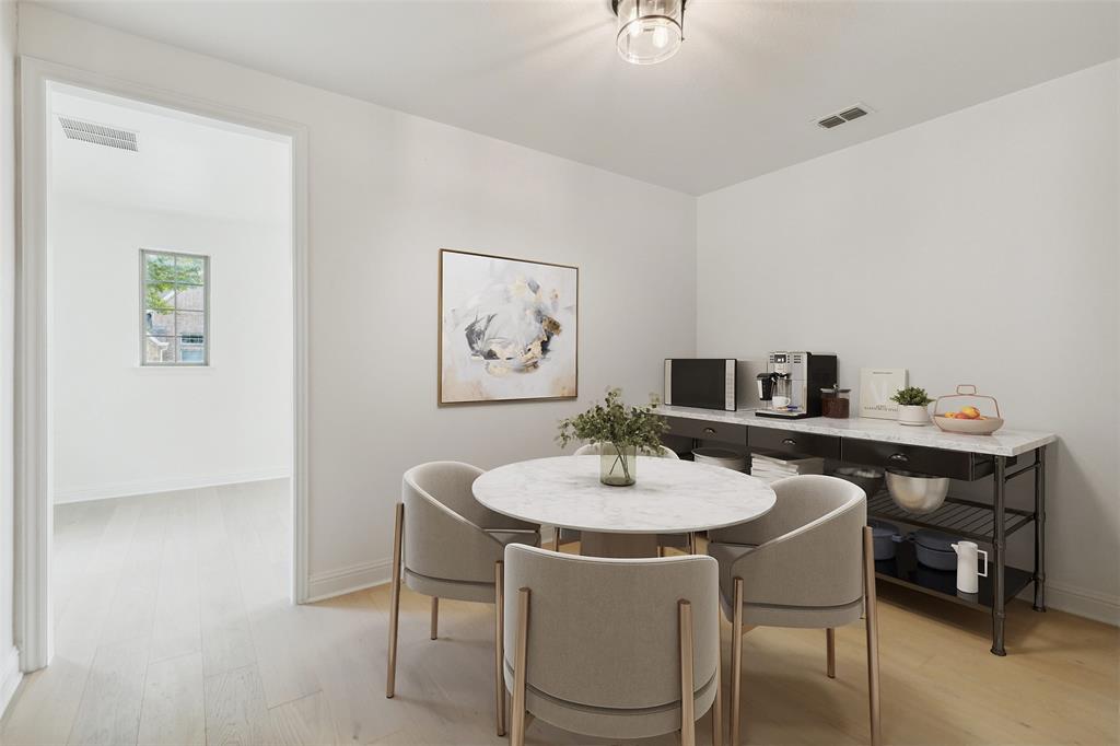 3737 Nottingham The Colony, TX 75056 - Photo 4 of 34 a view of a dining room with a table and chairs
