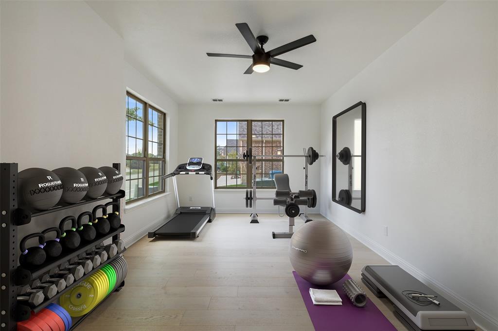 3737 Nottingham The Colony, TX 75056 - Photo 7 of 34 a living room with furniture gym equipment and a window