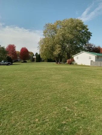a view of outdoor space and yard