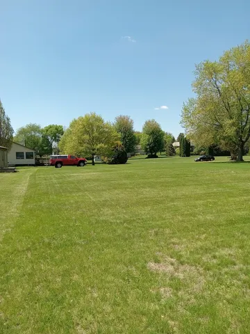 a view of an ocean from a yard