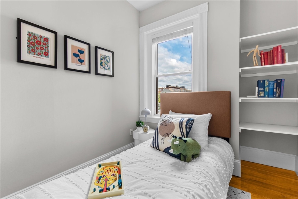9 Verndale Street, Unit 2 Brookline, MA 02446 - Photo 22 of 39 a bed room with furniture and a window