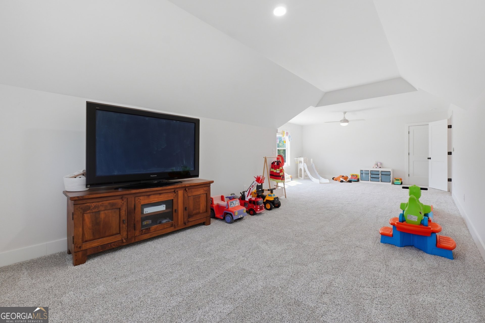 113 Kenmare Row Tyrone, GA 30290 - Photo 45 of 61 a living room with furniture and a flat screen tv