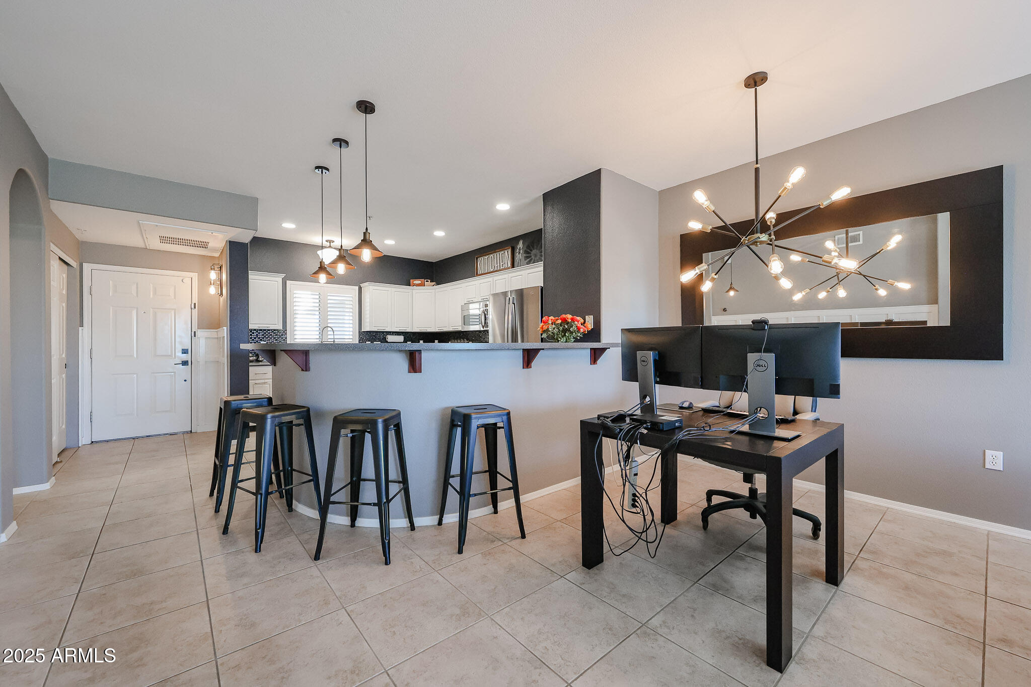920 East Devonshire Avenue, Unit 4001 Phoenix, AZ 85014 - Photo 11 of 38 a group of people sitting in a kitchen