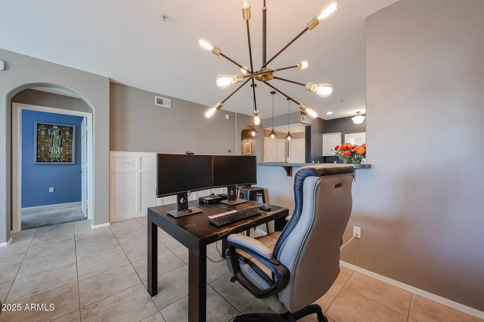 920 East Devonshire Avenue, Unit 4001 Phoenix, AZ 85014 - Photo 15 of 38 a workspace with furniture and chandelier