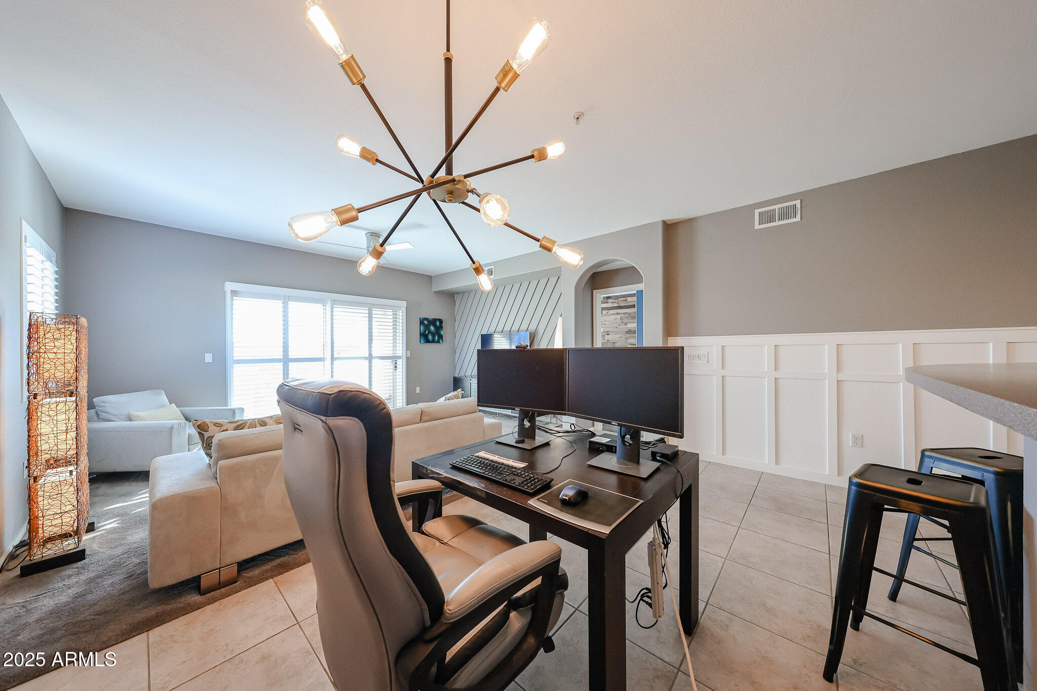 920 East Devonshire Avenue, Unit 4001 Phoenix, AZ 85014 - Photo 16 of 38 a view of a workspace with furniture and a chandelier