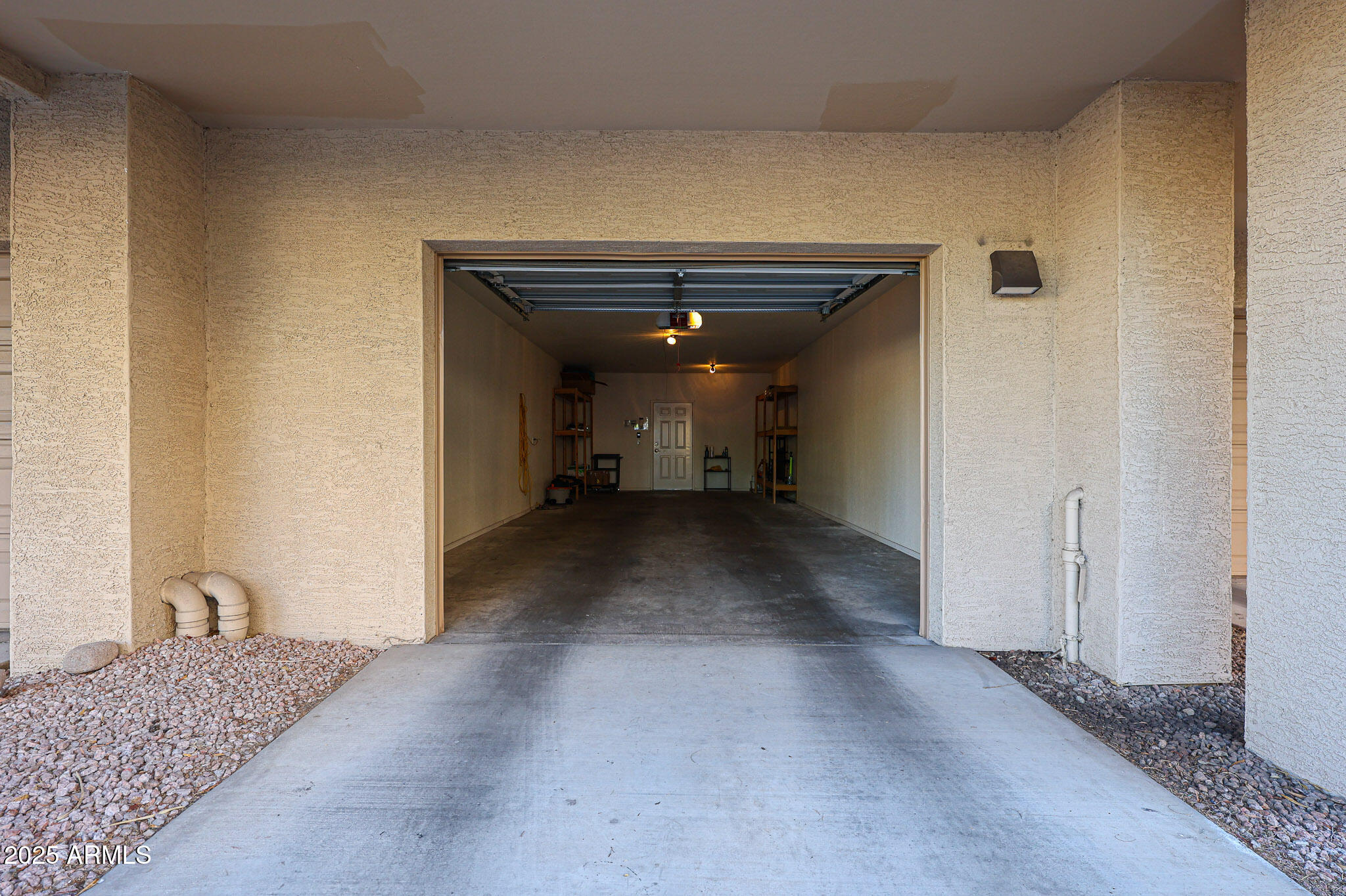 920 East Devonshire Avenue, Unit 4001 Phoenix, AZ 85014 - Photo 2 of 38 a view of a hallway view with staircase