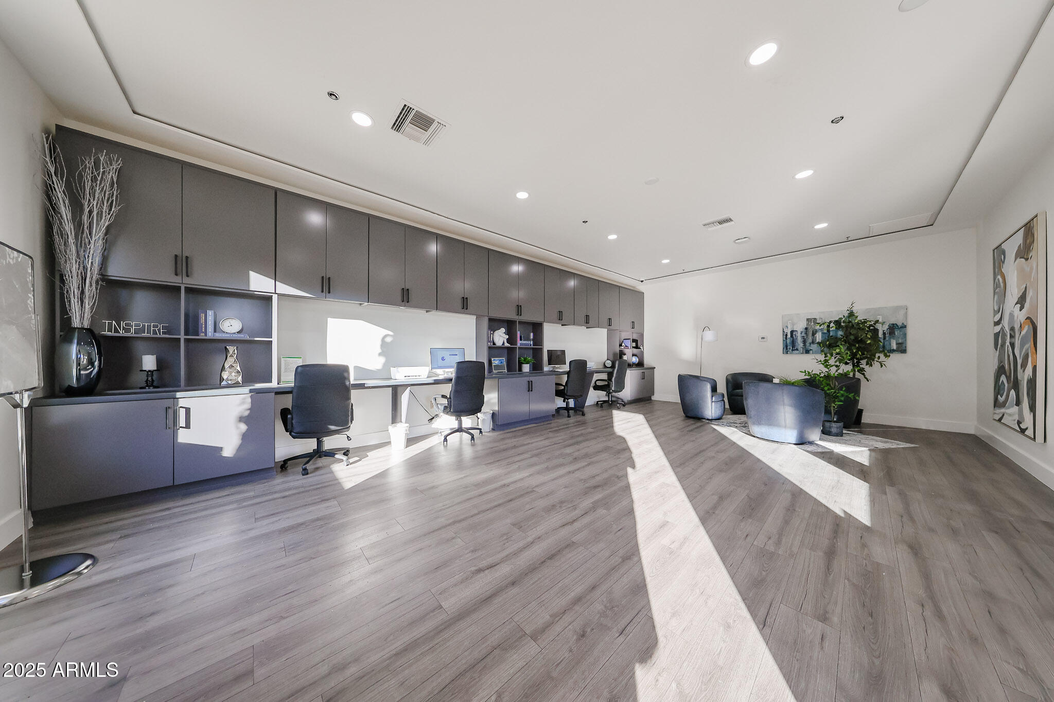 920 East Devonshire Avenue, Unit 4001 Phoenix, AZ 85014 - Photo 35 of 38 a living room with furniture and a wooden floor