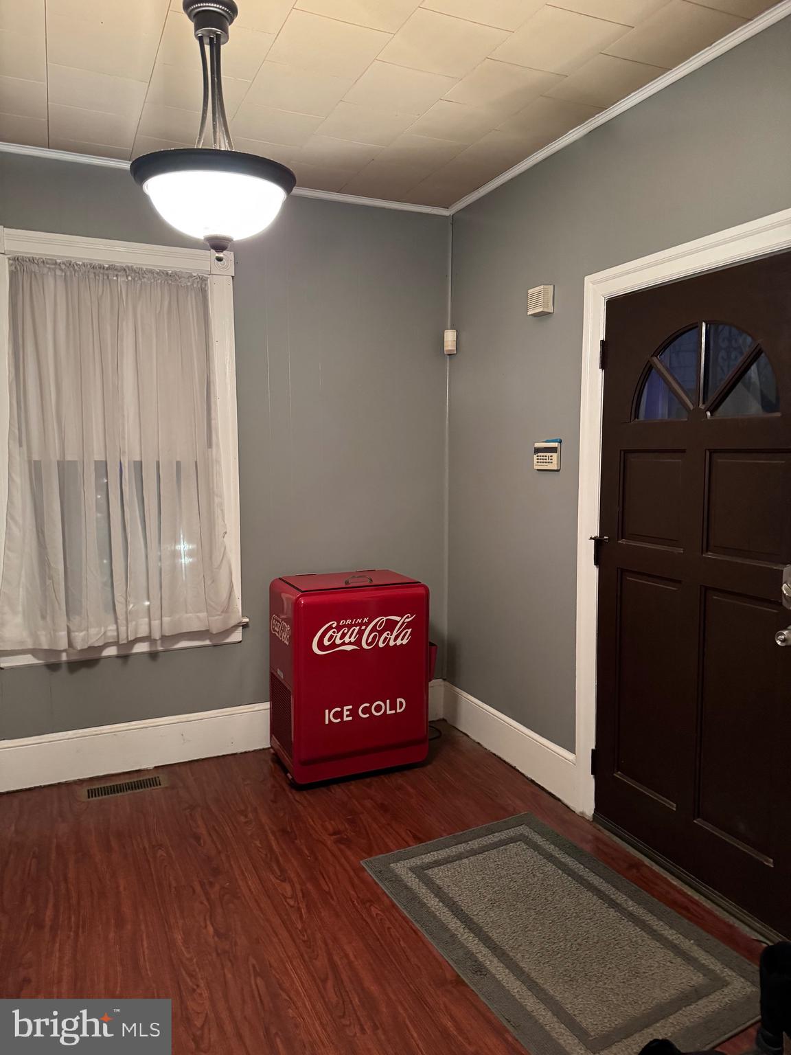 323 West 4th Street Florence, NJ 08518 - Photo 2 of 15 a view of a room with wooden floor and cabinet