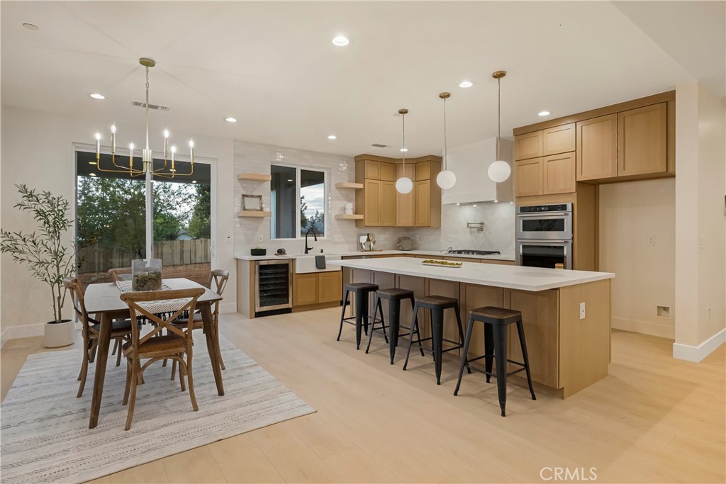 1560 Elliott Road Paradise, CA 95969 - Photo 15 of 50 a large kitchen with a table and chairs in it