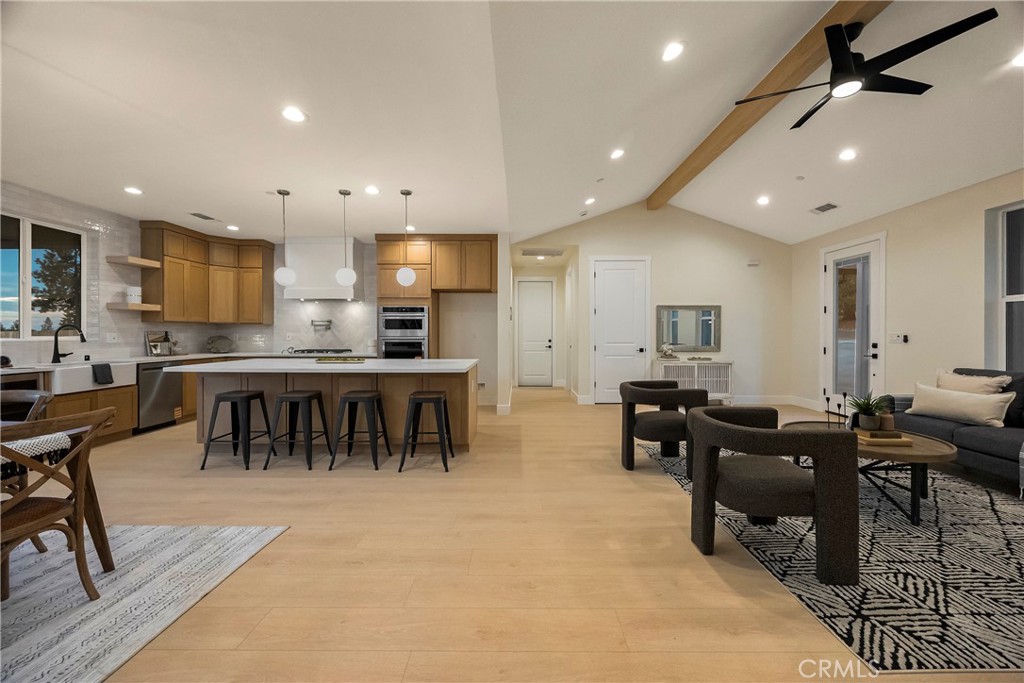 1560 Elliott Road Paradise, CA 95969 - Photo 16 of 50 a living room with stainless steel appliances furniture and a dining table