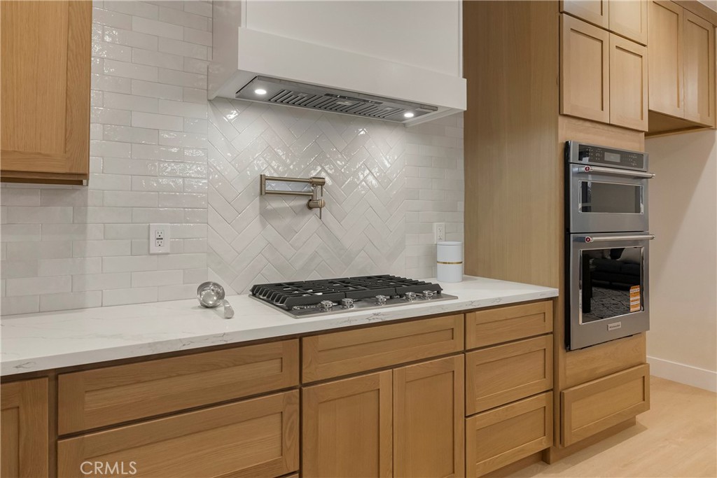 1560 Elliott Road Paradise, CA 95969 - Photo 19 of 50 a kitchen with cabinets and appliances