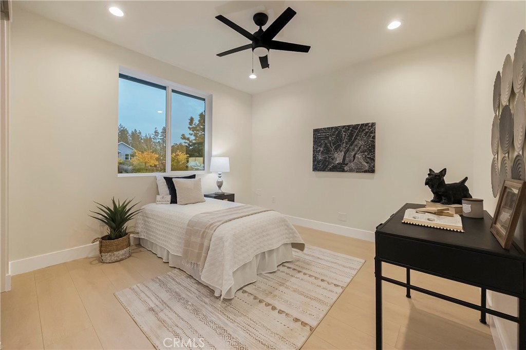 1560 Elliott Road Paradise, CA 95969 - Photo 22 of 50 a bedroom with a bed and a desk