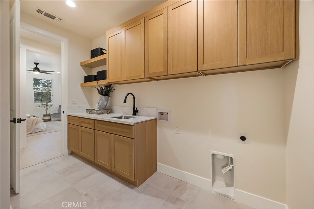 1560 Elliott Road Paradise, CA 95969 - Photo 29 of 50 a room with cabinets and a sink