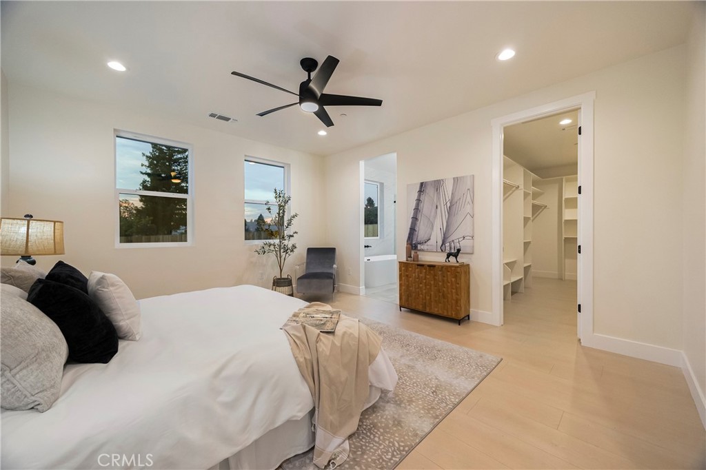 1560 Elliott Road Paradise, CA 95969 - Photo 30 of 50 a bedroom with a bed and a large mirror