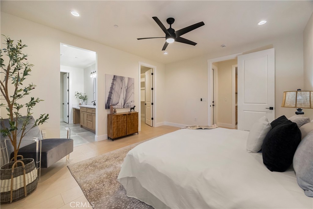 1560 Elliott Road Paradise, CA 95969 - Photo 31 of 50 a bedroom with a bed a couch and potted plant