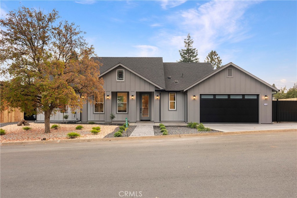 1560 Elliott Road Paradise, CA 95969 - Photo 10 of 50 a front view of a house with a garden and yard