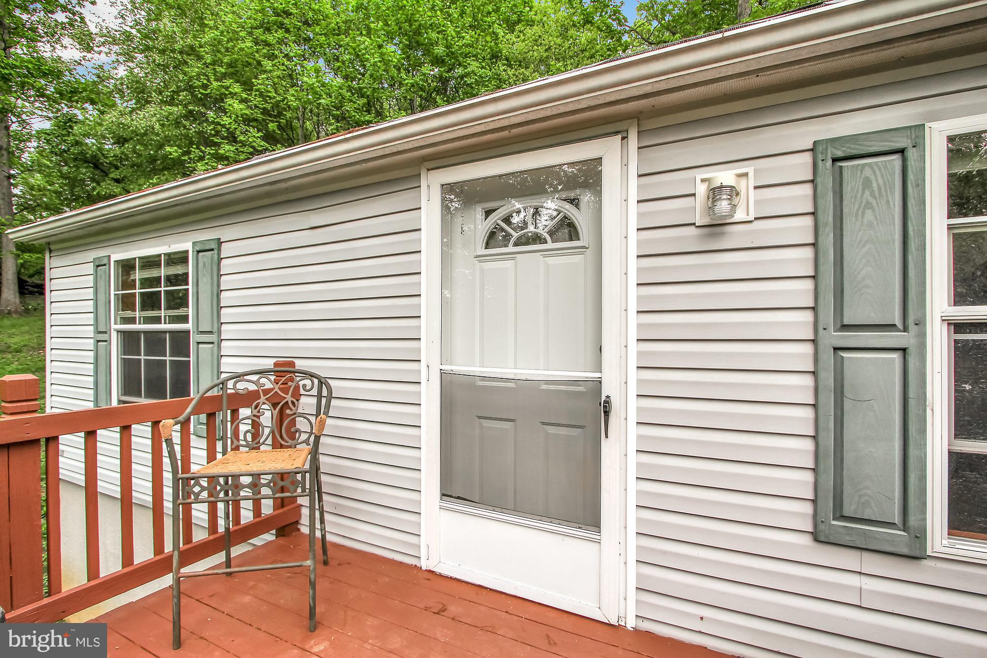 725 Garvine Mill Road Fawn Grove, PA 17321 - Photo 19 of 26 Fornt Door/Deck