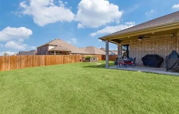 a view of a porch in front of house