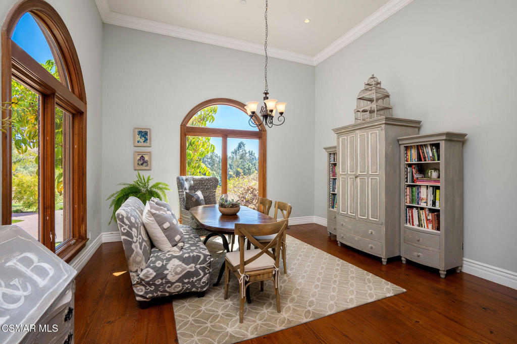 6934 Solano Verde Drive Somis, CA 93066 - Photo 20 of 80 a dining room with furniture a window and wooden floor
