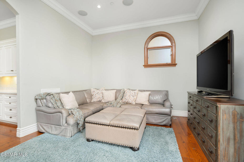 6934 Solano Verde Drive Somis, CA 93066 - Photo 22 of 80 a living room with furniture and a flat screen tv