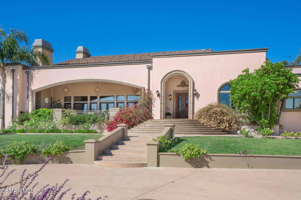6934 Solano Verde Drive Somis, CA 93066 - Photo 3 of 80 a front view of a house with a yard