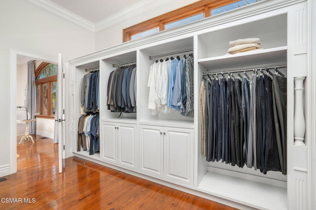 6934 Solano Verde Drive Somis, CA 93066 - Photo 35 of 80 a view of walk in closet with clothes and shoes