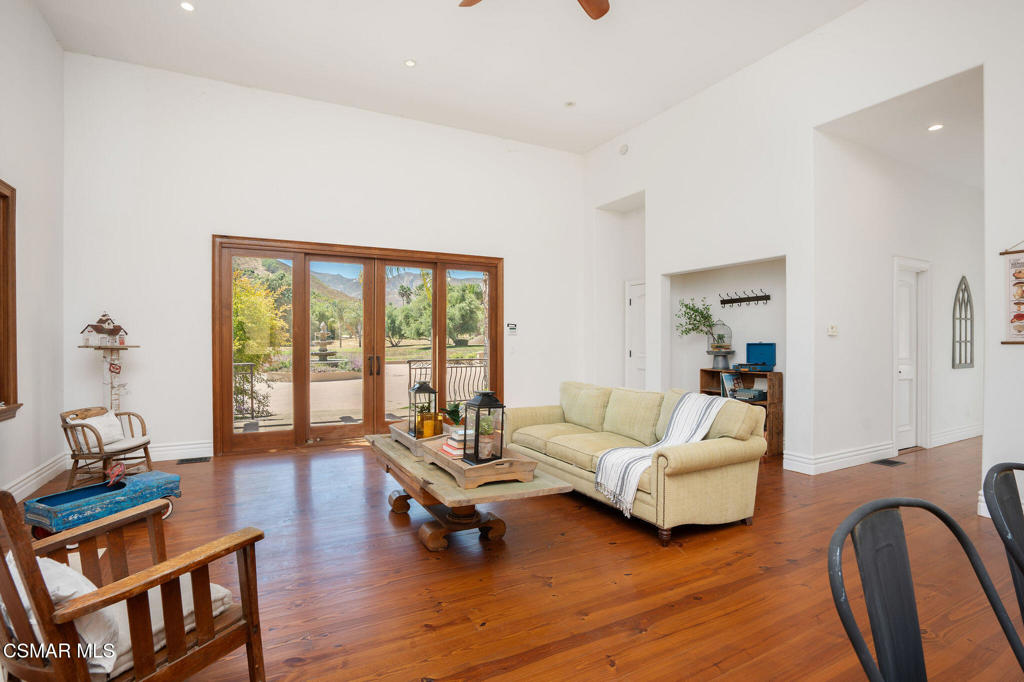 6934 Solano Verde Drive Somis, CA 93066 - Photo 55 of 80 a living room with furniture and a large window