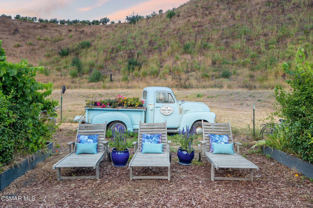 6934 Solano Verde Drive Somis, CA 93066 - Photo 72 of 80 an aerial view of a house with garden space and seating