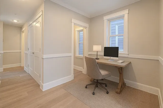 a view of a workspace with furniture