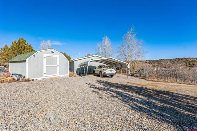 a view of a houses with a yard