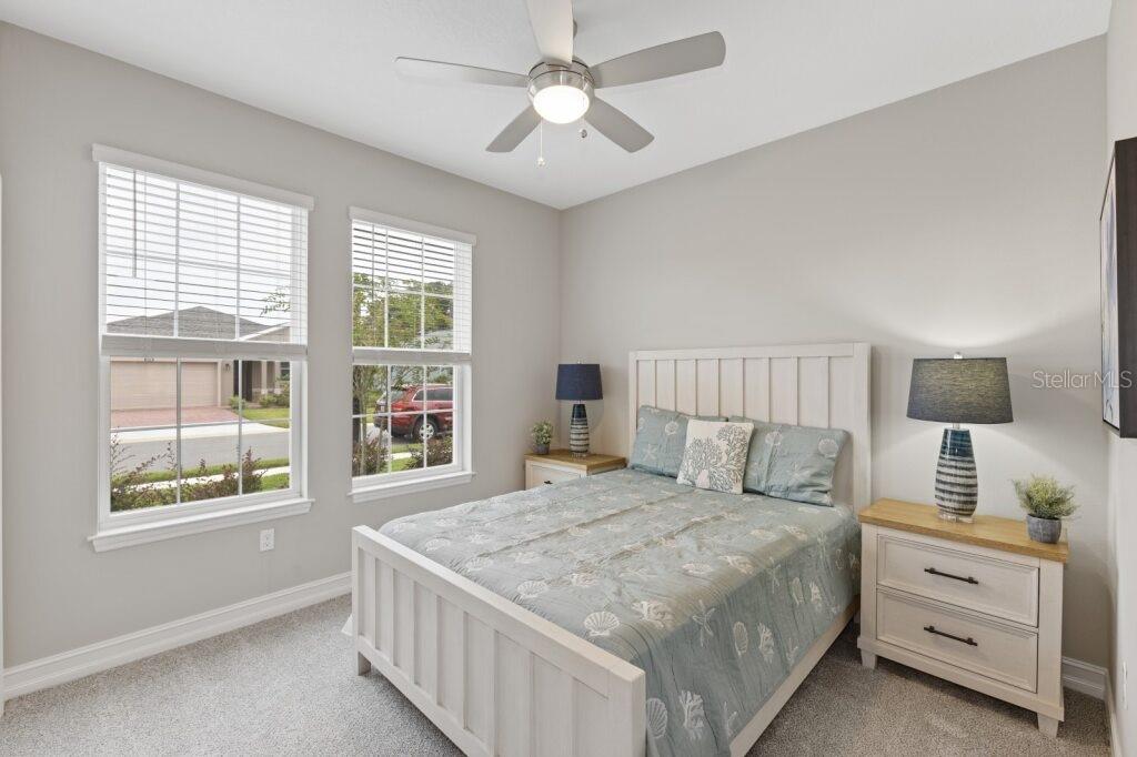 5567 Northwest 45th Lane Ocala, FL 34482 - Photo 18 of 21 a bedroom with a large bed and a window