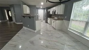 a view of a kitchen with a sink