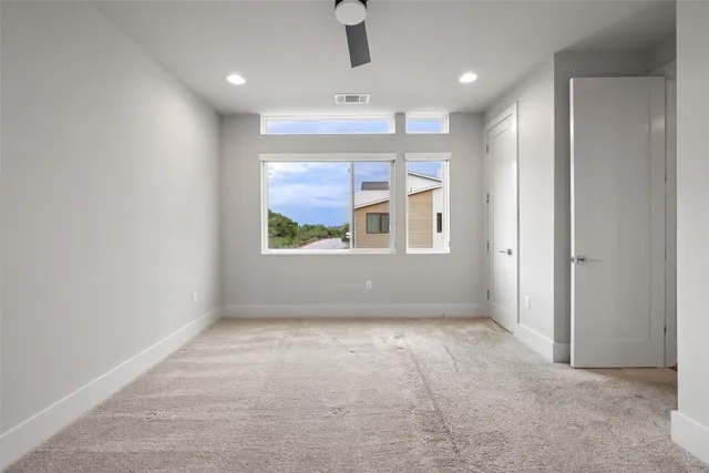 a bathroom with a double vanity sink a mirror and shower